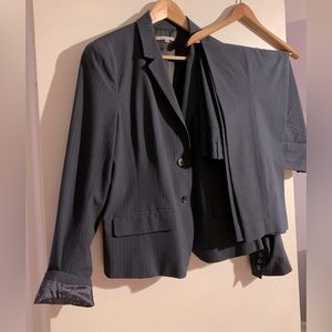 Preowned Blue pinstripe crop pant suit in size 11/12 is in great condition.